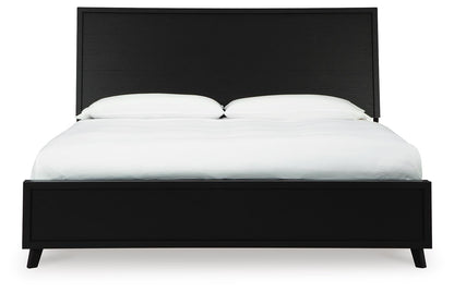 Danziar King Panel Bed with Mirrored Dresser