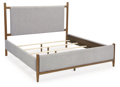 Lyncott Queen Upholstered Bed with Mirrored Dresser