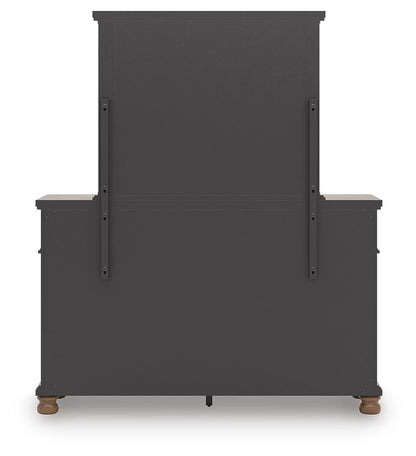 Chadworth California King Poster Bed with Mirrored Dresser